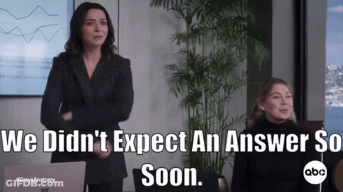 Two Women Standing In Front Of A Laptop With The Words We Did N't Expect An Answer So Soon Below Them GIF