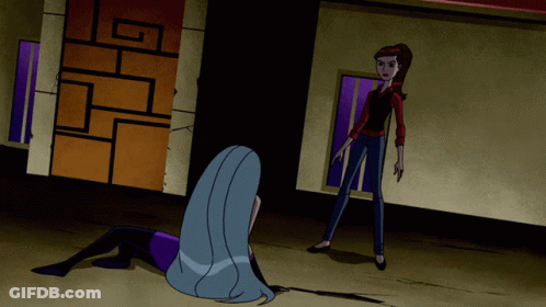 Two Women Standing In Front Of Building GIF