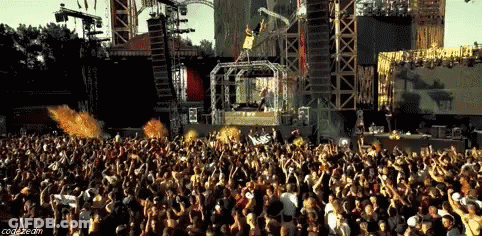 Two Women Standing In Front Of Kupatan Live Online Live Screen GIF