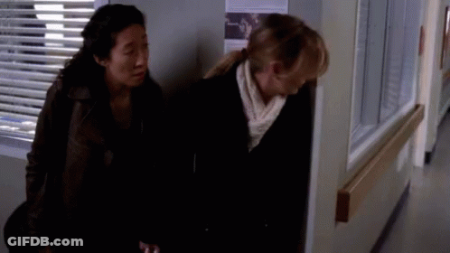 Two Women Standing In Hospital Hallway GIF