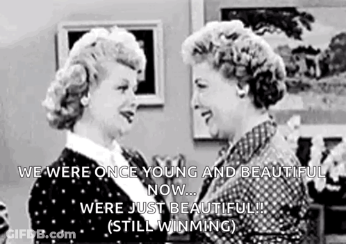 Two Women Standing In Living Room Talking GIF