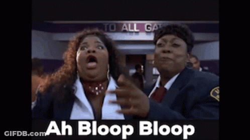 Two Women Standing Near Ah Bloop Bloop Sign GIF