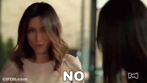 Two Women Standing Next To Each Other GIF