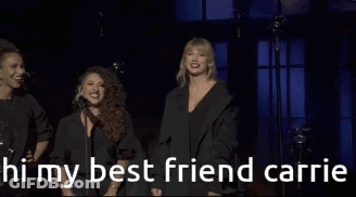 Two Women Standing Next To Each Other GIF