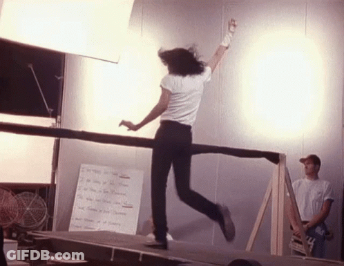 Two Women Standing Next To Each Other One In Pink Dress GIF