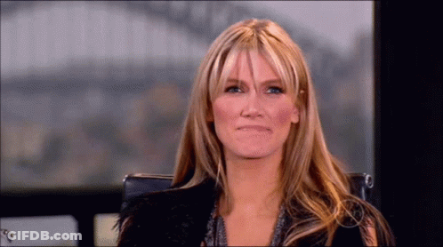 Two Women Standing Next To Each Other One With Ring GIF