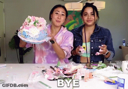 Two Women Standing Next To Each Other With One Holding A Cake And The Other Holding A Piece Of Cake With The Word Bye Ab GIF