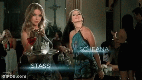 Two Women Standing Next To Each Other With The Name Stassi And Scheana GIF