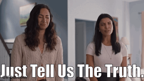 Two Women Standing Next To Each Other With The Words Just Tell Us The Truth Written Below Them GIF