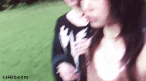 Two Women Standing On Green Field GIF