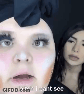 Two Women Standing Side By Side One Wearing Makeup GIF