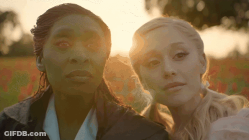 Two Women Standing Together In Sunlight GIF