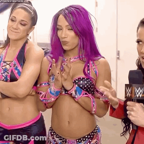 Two Women Standing Together One Wearing Bay Ley Shirt GIF