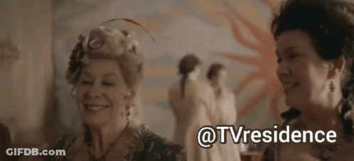 Two Women Standing With @Tvresidence Behind Them GIF
