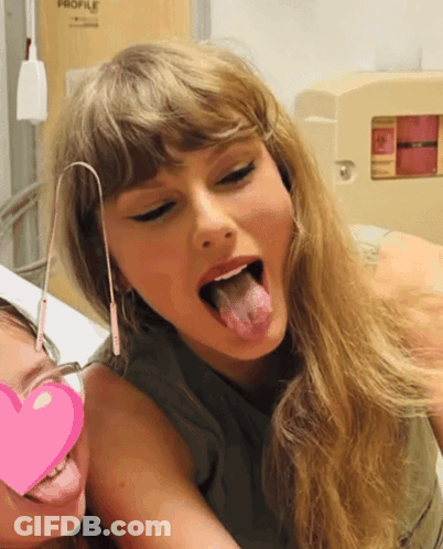 Two Women Sticking Tongues Out At Profile Sign GIF