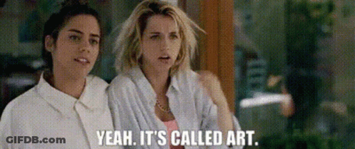 Two Women Talking About Art GIF