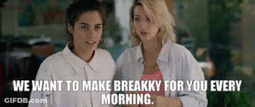 Two Women Talking About Art GIF