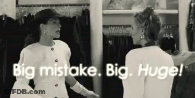 Two Women Talking In Closet GIF