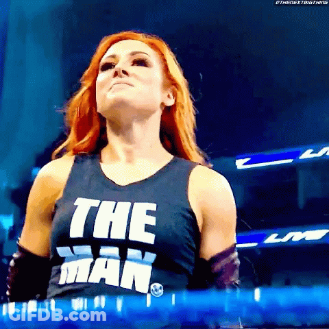 Two Women Talking In Wrestling Ring With WWE Belt GIF