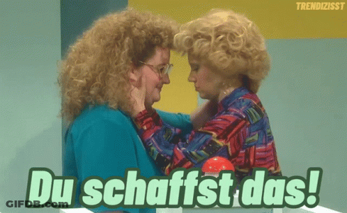 Two Women Touching With Du Schaffst Das GIF