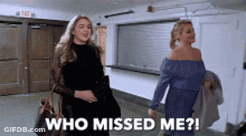 Two Women Walking Down A Hallway With The Words Who Missed Me On The Bottom GIF