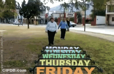 Two Women Walking Past Monday Thursday And Friday Sign GIF
