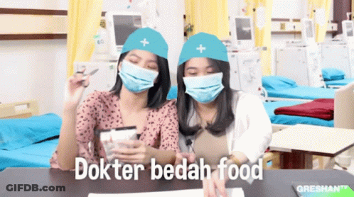 Two Women Wearing Masks And Hats GIF