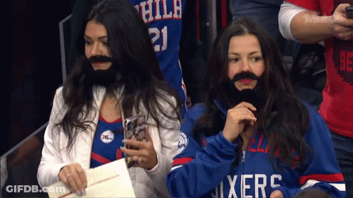Two Women With Fake Beards At 76Ers Stadium GIF