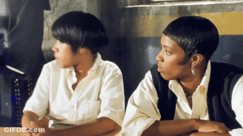 Two Women With Hands On Hips GIF