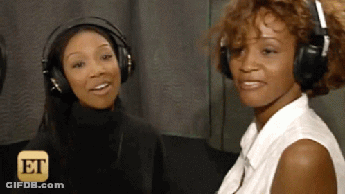 Two Women With Headphones And Et Sticker GIF