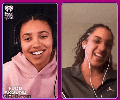 Two Women With Headphones Fudd Around And Find Out GIF