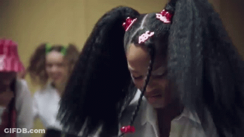 Two Women With Long Black Hair, One Ponytailed GIF