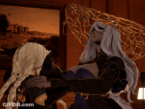 Two Women With Long White And Blonde Hair Side By Side GIF