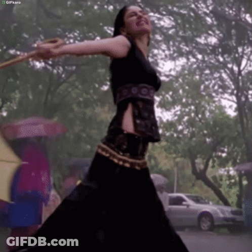 Two Women With Open Mouths And Arms Up GIF
