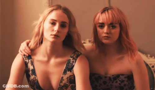 Two Women With Pink Hair Are Posing For A Picture GIF