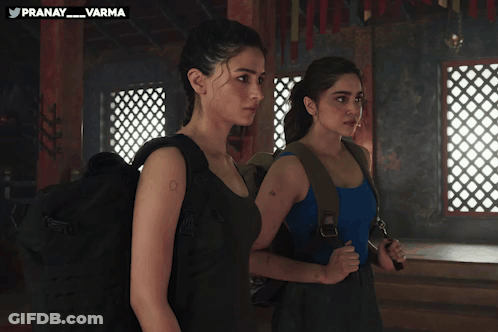 Two Women With Pranay Varma Watermark GIF