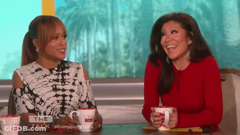 Two Women With Sign The Talk GIF
