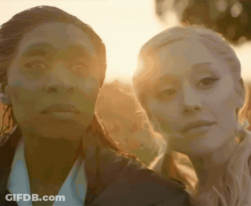 Two Women With Sun Behind Them GIF
