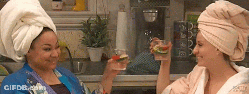 Two Women With Towel Turbans Toasting GIF