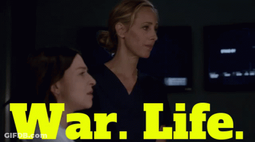 Two Women With War Life In Yellow GIF