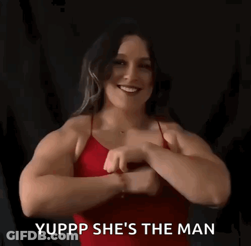 Two Women Working In Kitchen With Sign GIF