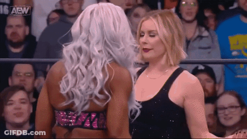 Two Women Wrestling In Front Of Crowd GIF