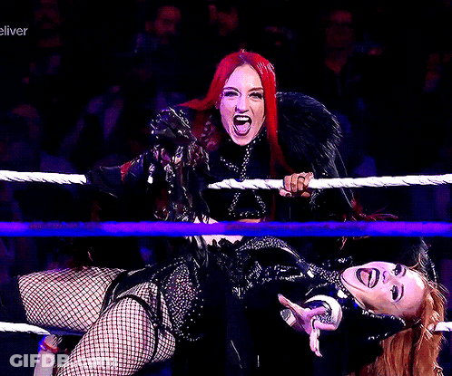 Two Women Wrestling In Ring Saying Eliver GIF