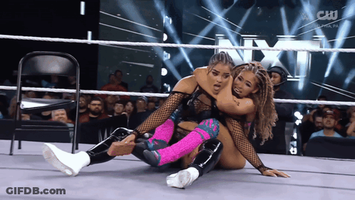 Two Women Wrestling In Ring With N GIF