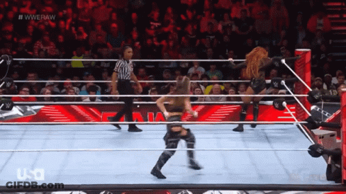 Two Women Wrestling In Ring With Referee WWERAW GIF