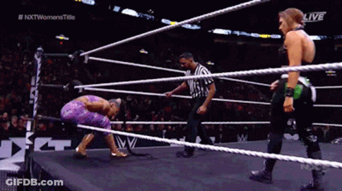 Two Women Wrestling With Referee In Ring GIF