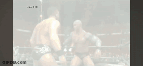 Two Wrestlers Are Fighting In A Ring With The Words Wwe Hd On The Bottom Left GIF
