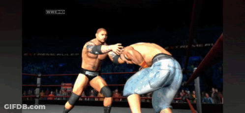 Two Wrestlers Are Fighting In A Ring With WWE Hd On The Bottom Right GIF