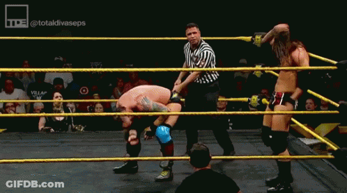 Two Wrestlers Are In A Ring With A Referee And The Hashtag Totaldivaseps GIF