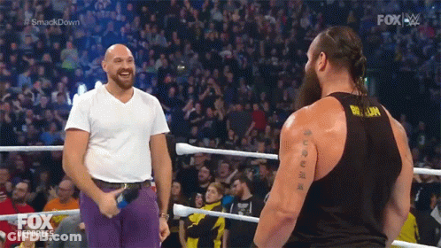Two Wrestlers Are Standing In A Ring With Fox Deportes Written On The Bottom Right GIF